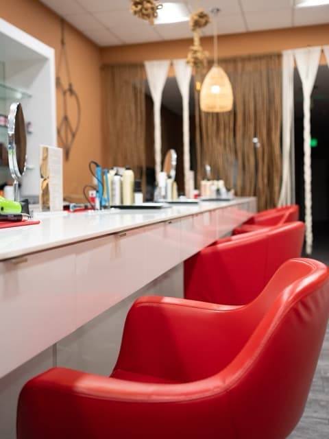 Additional interior view of the salon stations and workspace